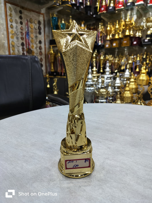 Gold star achievement trophy; ideal for awards and recognition.